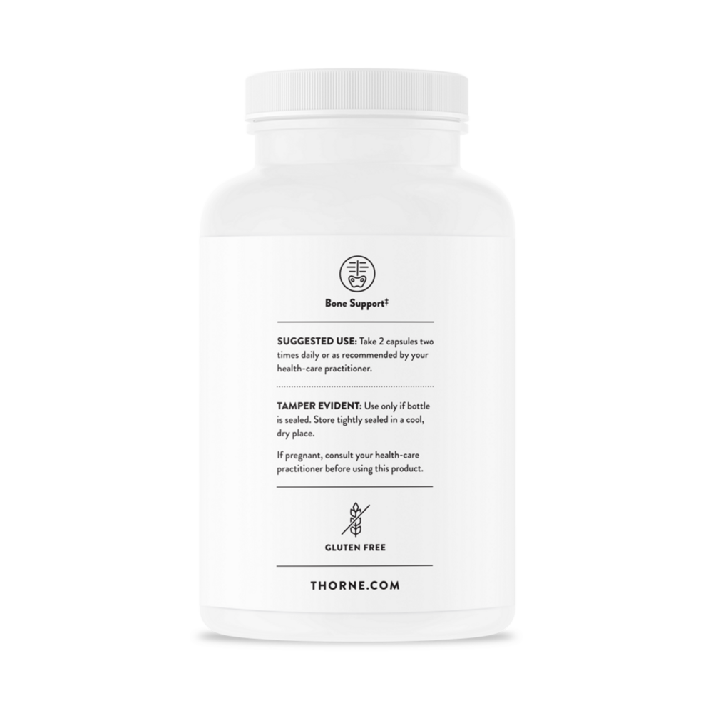 White supplement bottle with black text on a white background