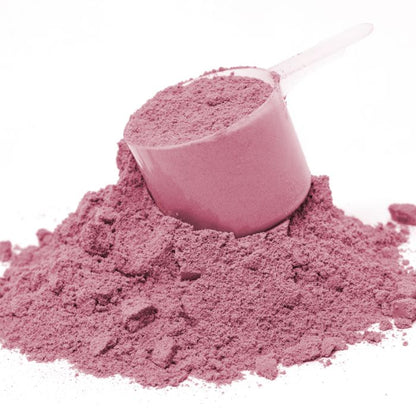 Pink powder with a scoop on a white background