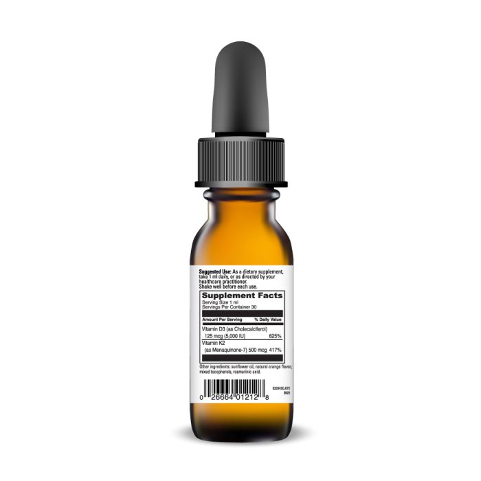 Bottle of dietary supplement with dropper on a white background