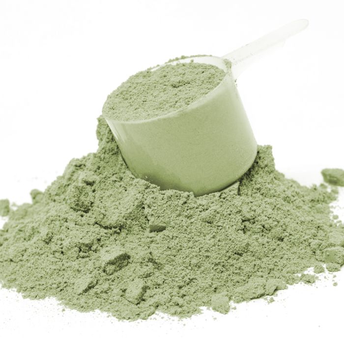 A picture of green powder with a white background