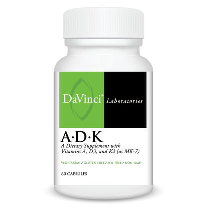 A bottle of Davinci Labs A•D•K dietary supplement with capsules, featuring vitamins A, D, and K2, displaying the brand logo and product information.
