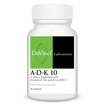 A bottle of Davinci Labs A.D.K 10 dietary supplement with capsules, marked with the brand logo and product information.