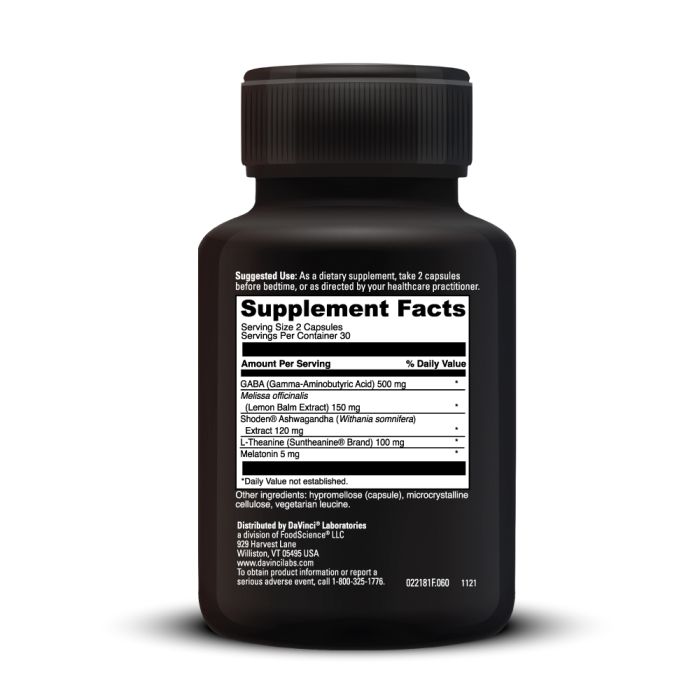 Black supplement bottle with white label on a white background
