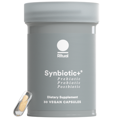 Gray container of Ritual Synbiotic+ dietary supplement on a white background