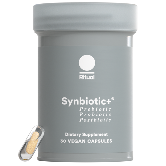 Gray container of Ritual Synbiotic+ dietary supplement on a white background