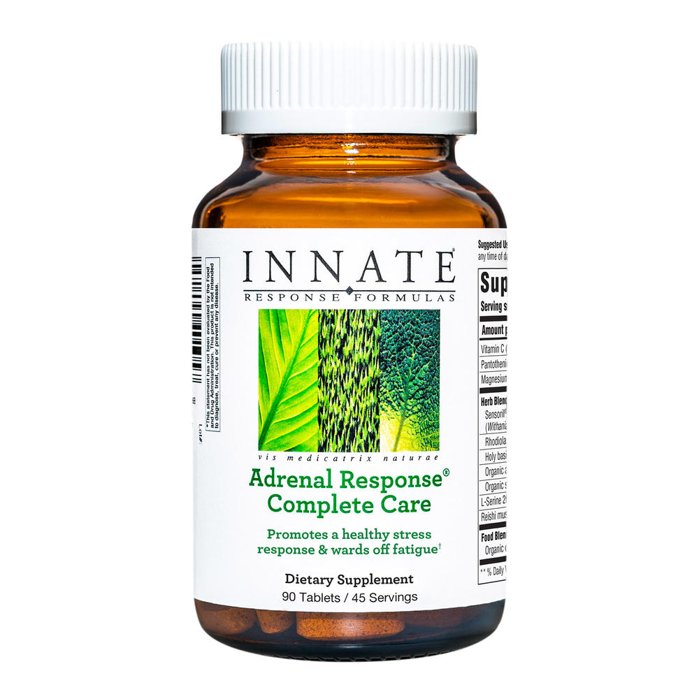 A bottle of Innate Response Adrenal Response® Complete Care dietary supplement with 90 tablets for 45 servings, showcasing the product's label which includes an image of green leaves and text detailing the product's benefits.