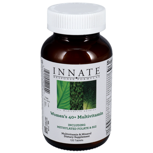 A bottle of Innate Response Women's 40+ Multivitamin, with a label showing the product name and mentions of contained vitamins and minerals.