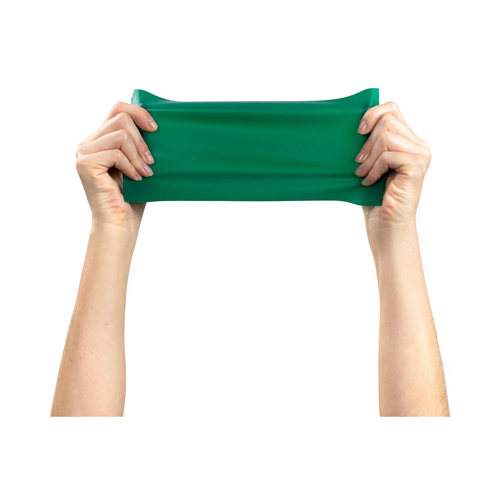 Green resistance band held by hands on a white background
