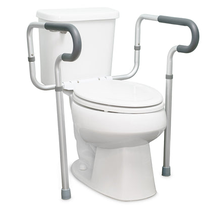 White toilet with a gray safety frame on a white background