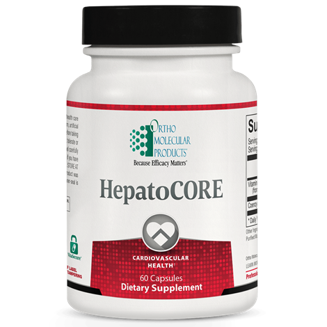 A bottle of Orthomolecular Products HepatoCORE dietary supplement, which appears to be white with a label that includes red and green accents and text indicating its function related to cardiovascular health.