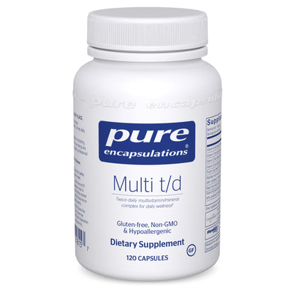 A bottle of Pure Encapsulations Multi t/d dietary supplement with 120 capsules, labeled as gluten-free and non-GMO.