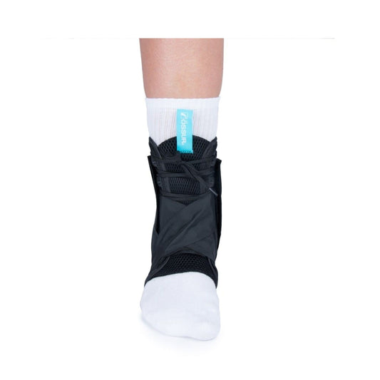 Black protective ankle brace on a white background