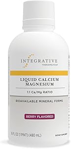 Bottle of Integrative Therapeutics Liquid Calcium Magnesium with a label indicating Berry flavor, 1:1 Ca/Mg ratio, and 500 mg per serving.