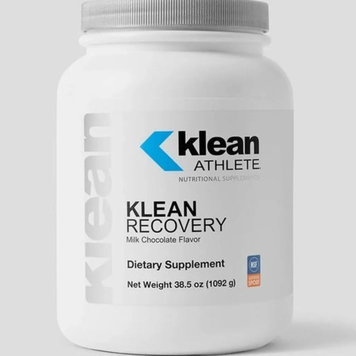A container of Klean Recovery dietary supplement in Milk Chocolate flavor, labeled as a dietary supplement with a net weight of 38.5 oz (1092 g).