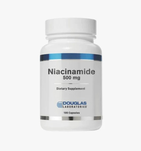 A bottle of Douglas Labs Niacinamide 500 mg dietary supplement containing 100 capsules.
