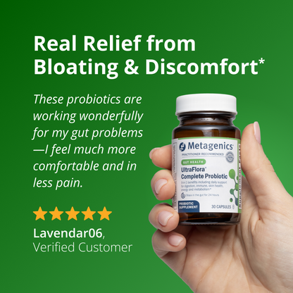 Hand holding a Metagenics probiotic bottle with customer testimonial on a green background