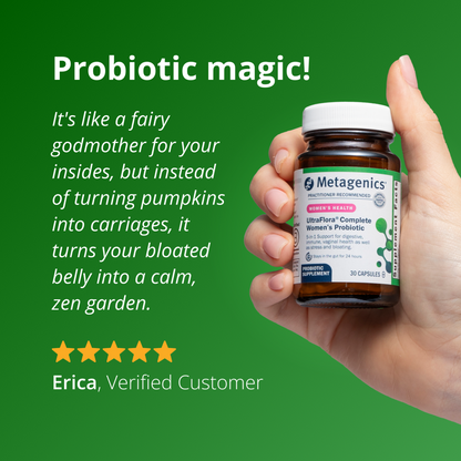 Hand holding a Metagenics probiotic bottle with promotional text on a green background