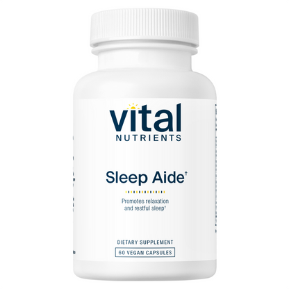 A white bottle with a blue and red label, labeled 'Vital Nutrients Sleep Aide, 50 vegan capsules, dietary supplement'.