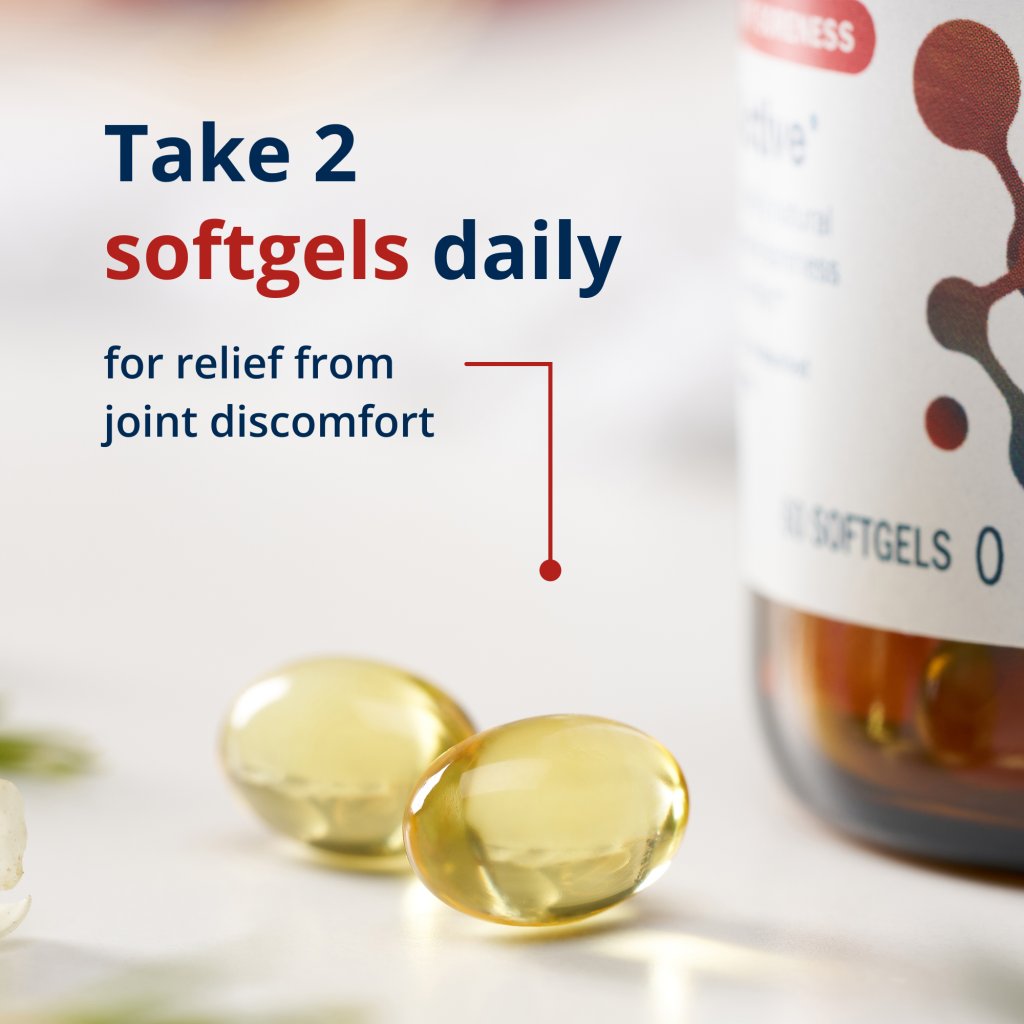 Vitamin supplement bottle with softgels and text on a blurred background