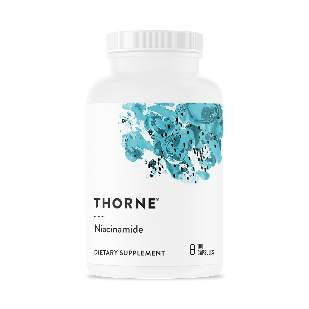 A bottle of Thorne Niacinamide dietary supplement with 60 capsules.