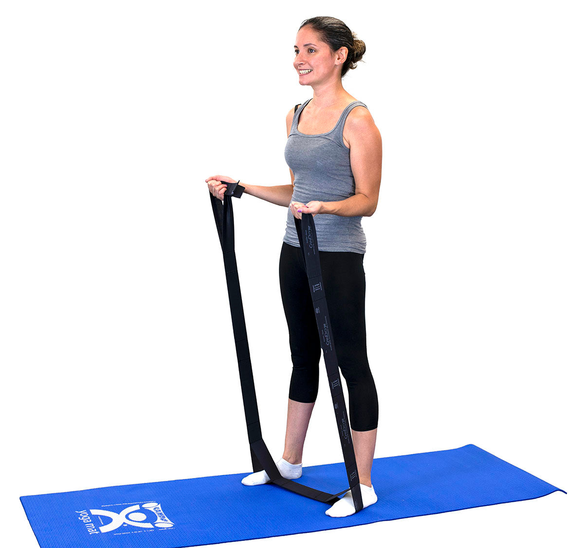 A female demonstrating the use of a black Cando multiexerciser.