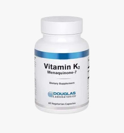 A bottle of Douglas Labs Vitamin K2 Menaquinone-7 dietary supplement with 60 vegetarian capsules.