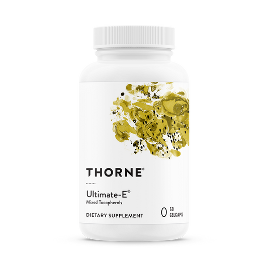 A bottle of Thorne Ultimate-E mixed tocopherols dietary supplement with a white label and yellow accents.