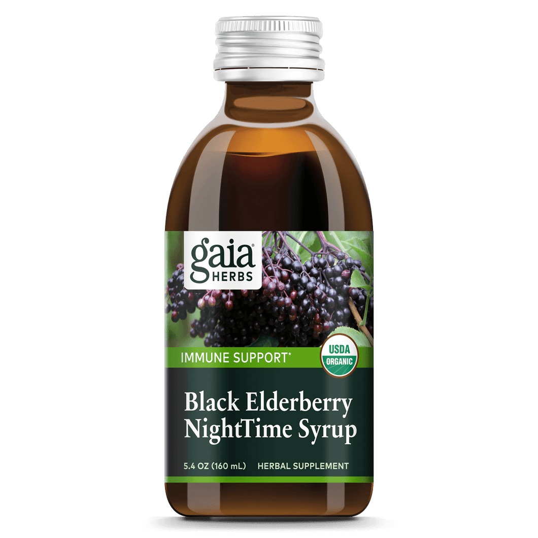 A bottle of Gaia Black Elderberry Nighttime Syrup with a label showing the brand, product name, and an image of elderberries. The bottle is marked with a COG (Certified Organic) logo.