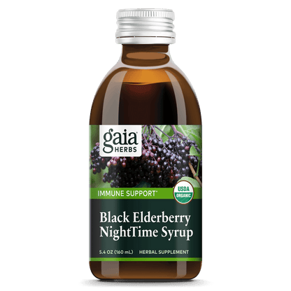 A bottle of Gaia Black Elderberry Nighttime Syrup with a label showing the brand, product name, and an image of elderberries. The bottle is marked with a COG (Certified Organic) logo.