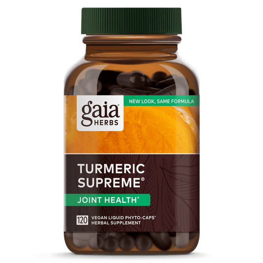 A bottle of Gaia Turmeric Supreme Joint capsules, with a label indicating it supports joint health and has 120 capsules inside.