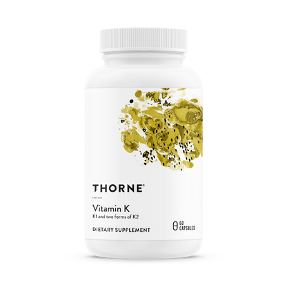 A bottle of Thorne Vitamin K dietary supplement with a white label and green and yellow accents.
