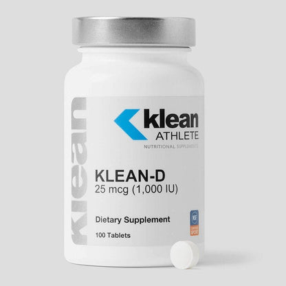 A bottle of Klean Athlete Klean-D 1000 dietary supplement with 100 tablets, featuring the brand logo and product information on the label.