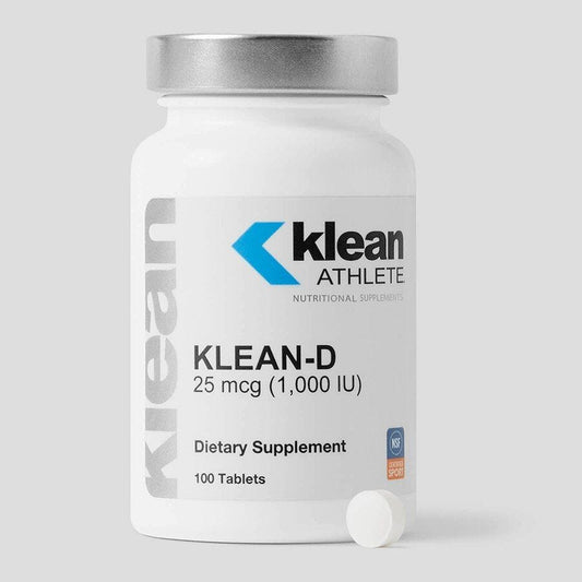 A bottle of Klean Athlete Klean-D 1000 dietary supplement with 100 tablets, featuring the brand logo and product information on the label.
