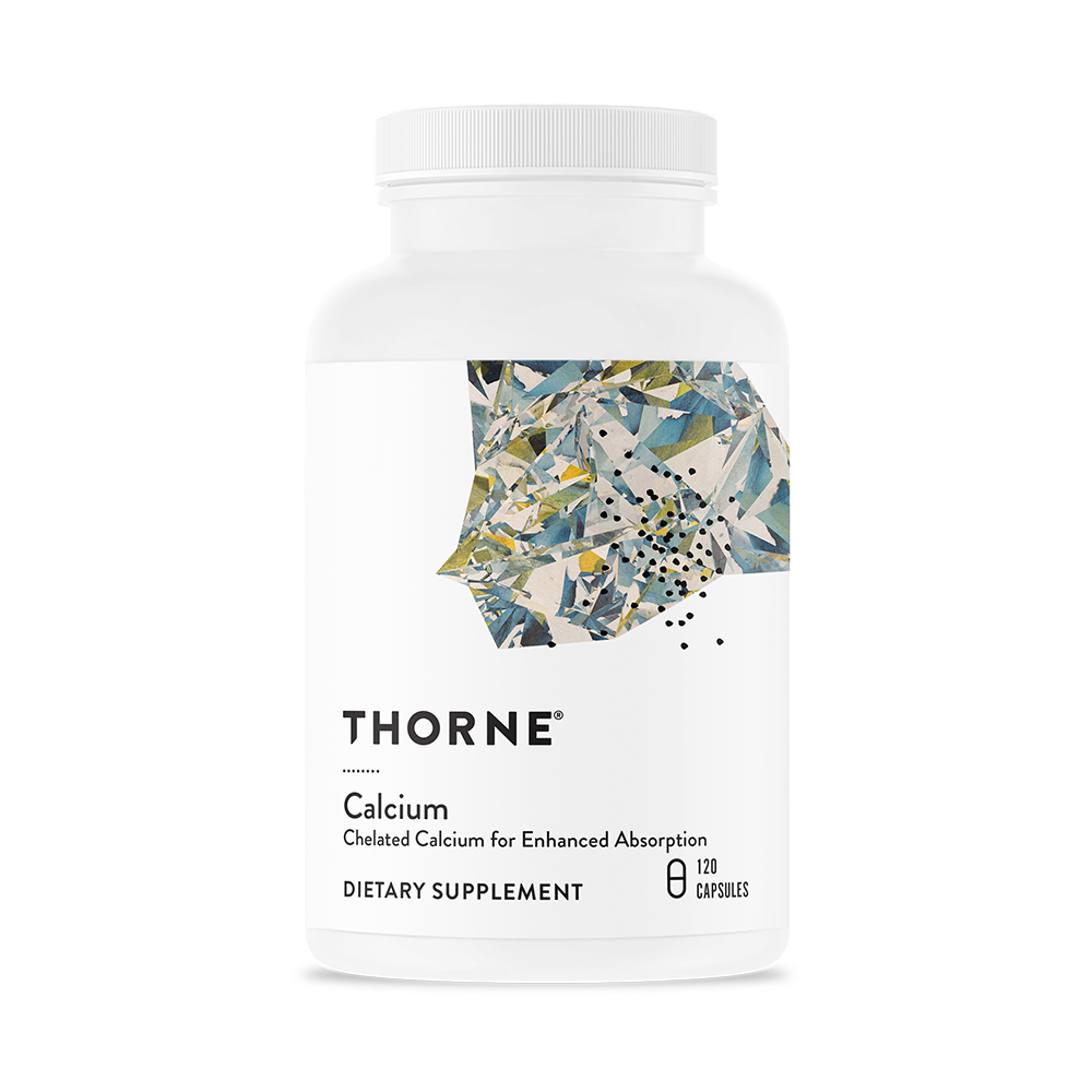A bottle of Thorne Calcium dietary supplement with a white label featuring a floral pattern.