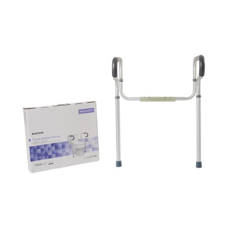 Toilet safety rail frame made of gray anodized aluminum with padded armrests, shown next to its packaging box.