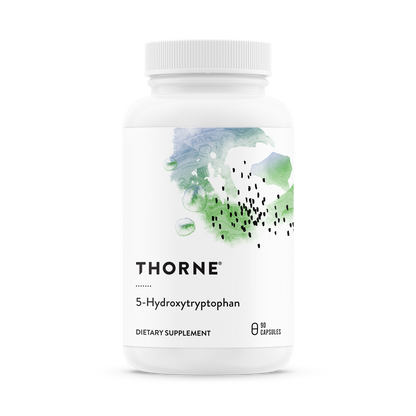 A bottle of Thorne 5-Hydroxytryptophan dietary supplement with a white label and green botanical designs.