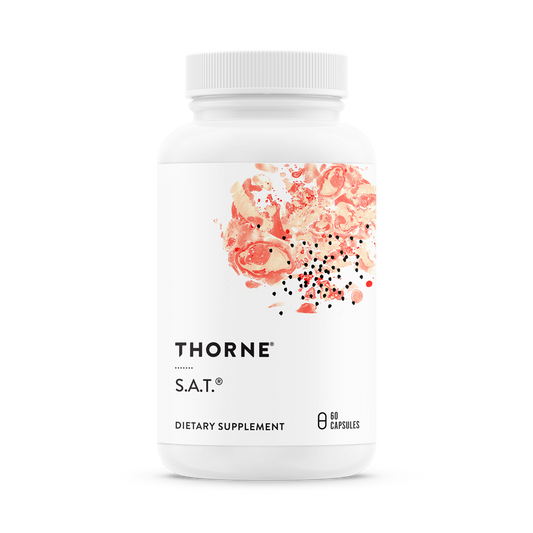 A bottle of Thorne S.A.T. dietary supplement with a floral design on the label.