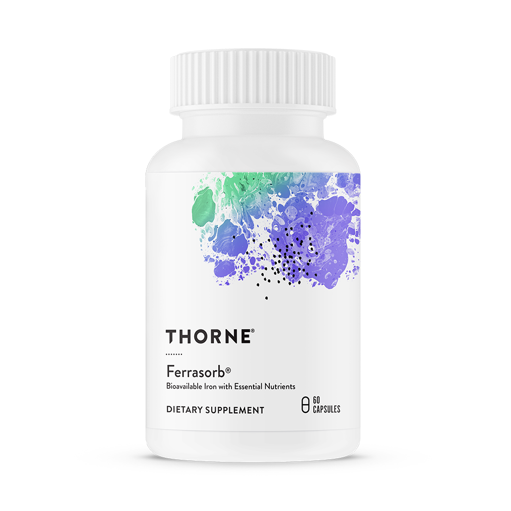 A bottle of Thorne Ferrasorb dietary supplement with a label showing a purple and green artistic design.