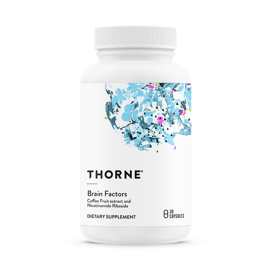 A bottle of Thorne Brain Factors dietary supplement with a floral design on the label.