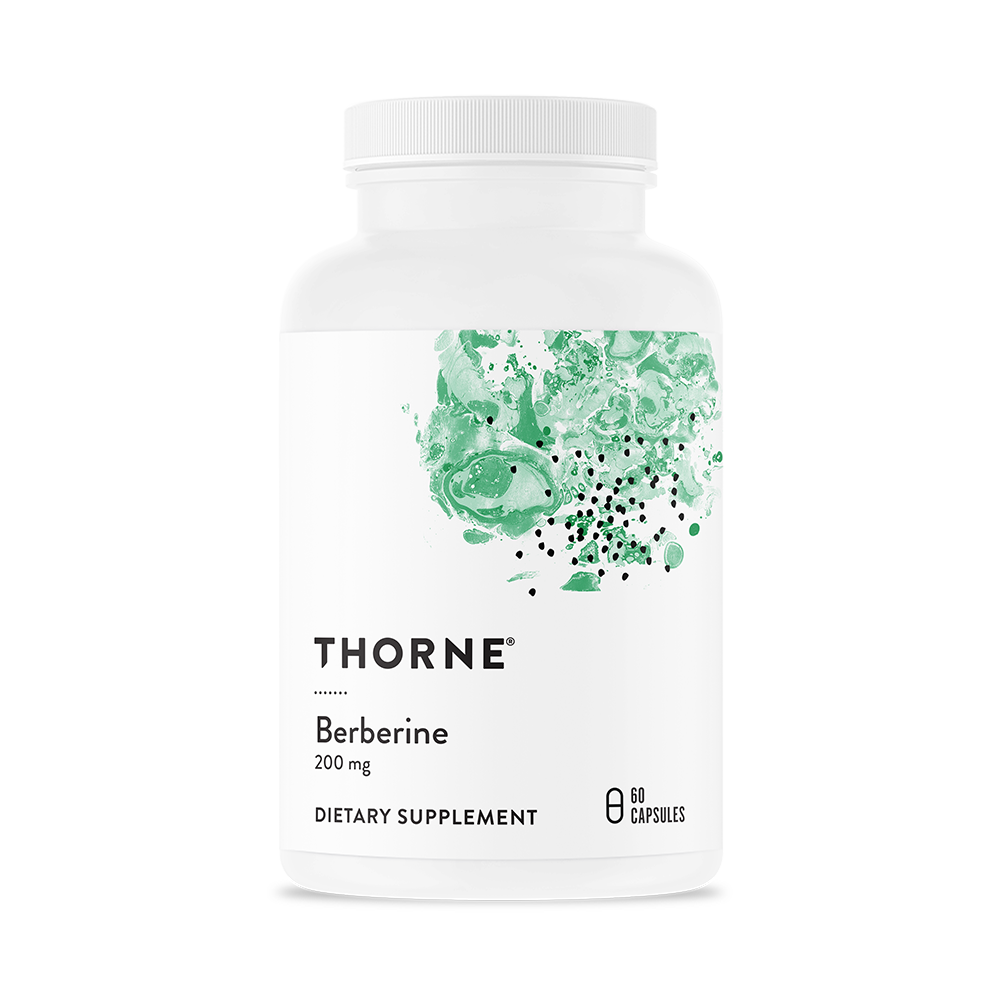 A bottle of Thorne Berberine 200 mg dietary supplement with a white label and green botanical design.