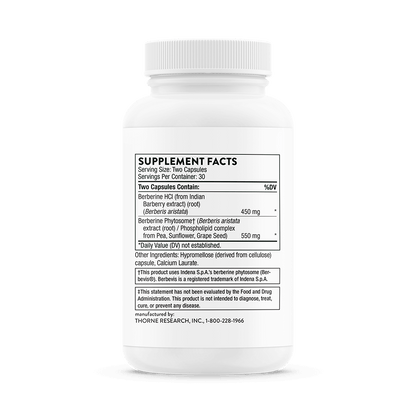 White supplement bottle with label on a black background