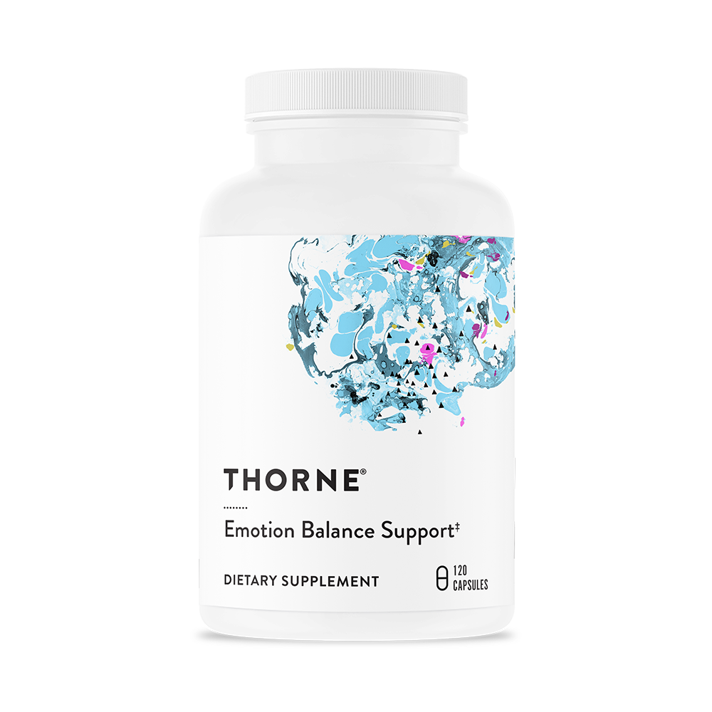 A bottle of Thorne Emotion Balance Support dietary supplement with a white label and blue floral design.