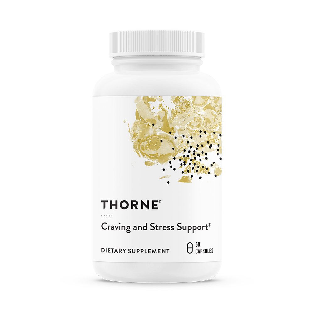 A bottle of Thorne Craving and Stress Support dietary supplement with a white label and gold accents.