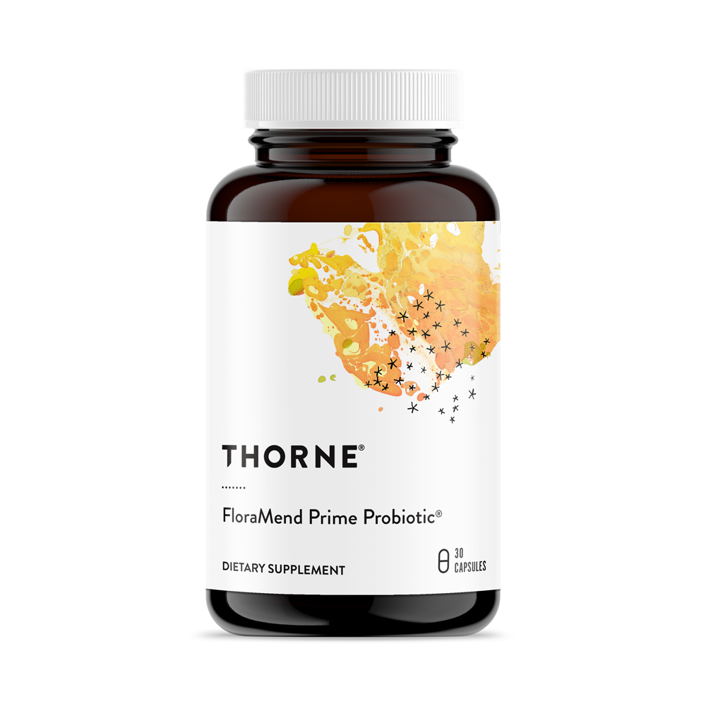 A bottle of Thorne FloraMend Prime Probiotic dietary supplement with a label showing a colorful artistic representation of gut flora.