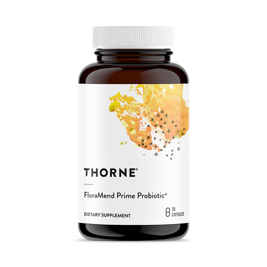 A bottle of Thorne FloraMend Prime Probiotic dietary supplement with a label showing a colorful artistic representation of gut flora.