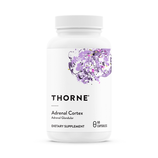 A bottle of Thorne Adrenal Cortex dietary supplement with purple flowers on the label.