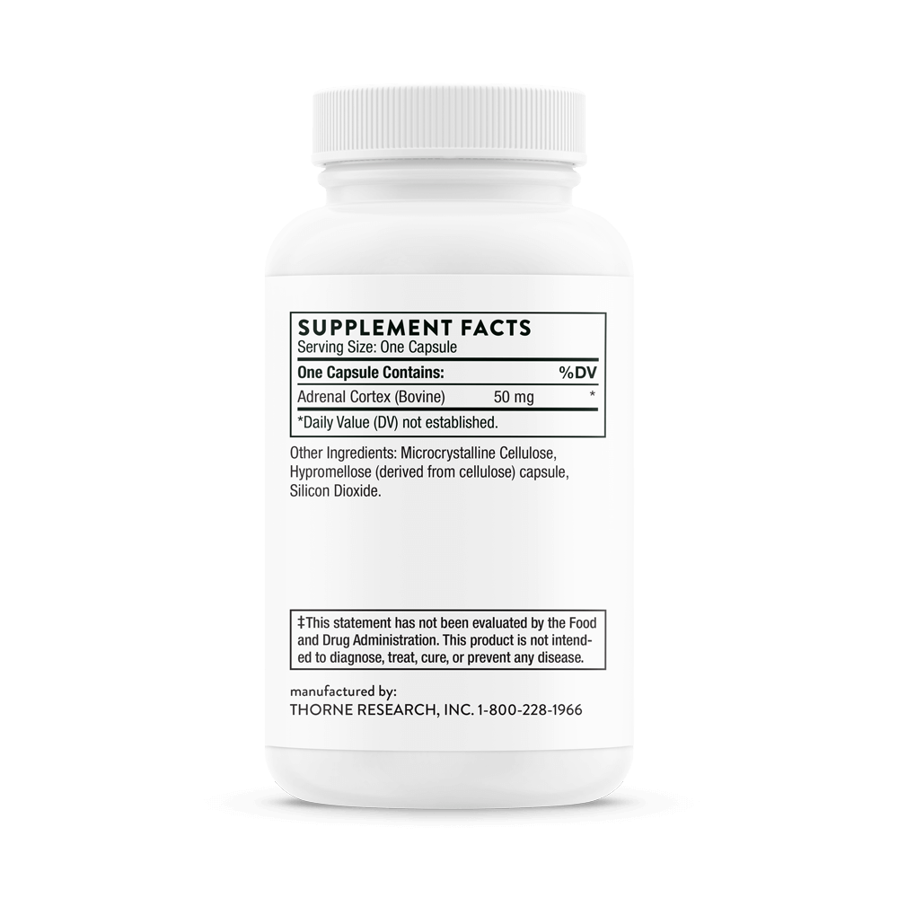 White supplement bottle with label on a black background