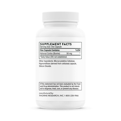 White supplement bottle with label on a black background