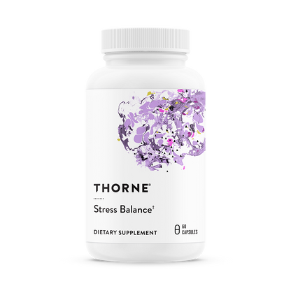 A bottle of Thorne Stress Balance dietary supplement with a purple and white label featuring floral design.