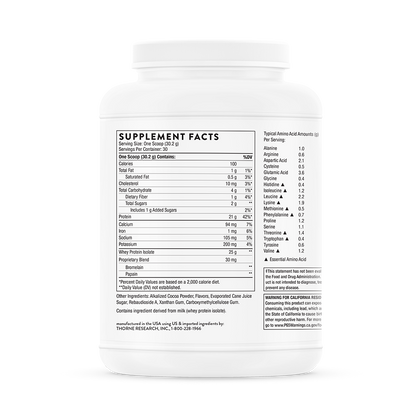 A white container with supplement facts listed on the back.  
